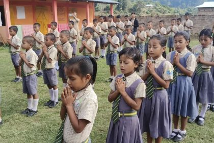 Image: Students praying in a ISKCON-run school