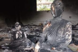 Image: burnt Buddha Murti of the temple
